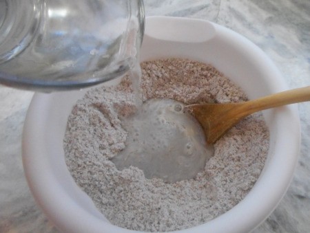 adding water to Blue Corn Flour