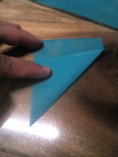 Christening Candles with Drip Catcher - fold one of the squares diagonally to form a triangle