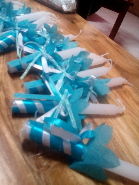 Christening Candles with Drip Catcher - row of finished candles