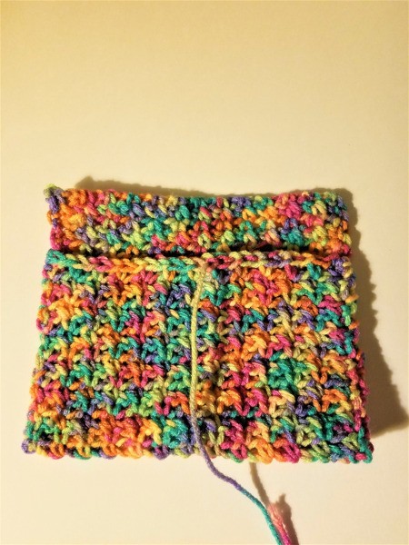 Crocheted Remote Pouch - sew up the side seams and the center to create two slots