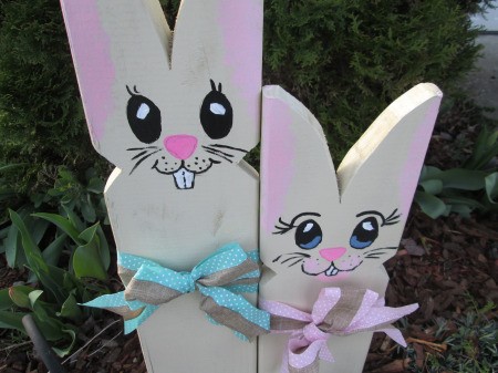 Wooden Bunnies - paint faces and spray with clear coat then add bows