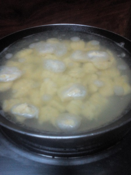 Sweet Potato Bites in boiling water