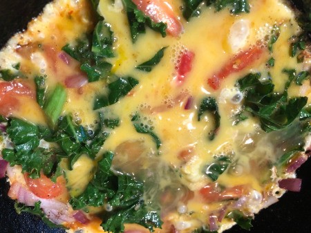 Egg poured on Frittata