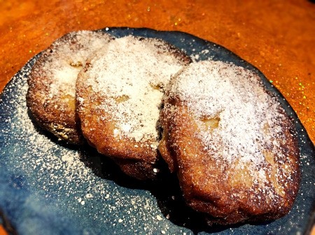 dusted Apple Banana Fritters on plate