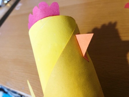 Toilet Paper Tube Chicken - glue comb inside the tube, fold beak and glue in place