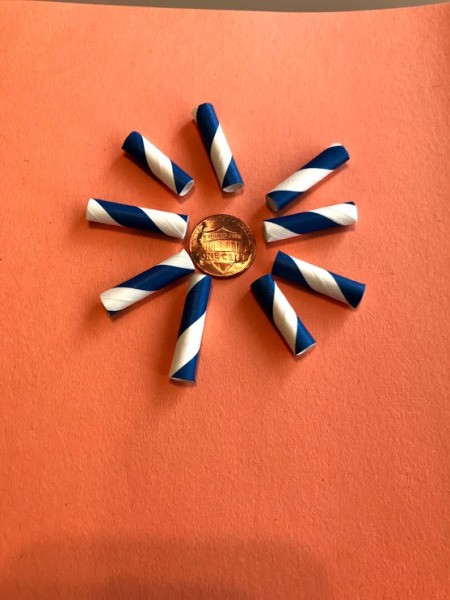 Straw Flowers on Paper - glue a penny down to your background paper for the center of the flower  and glue straw section around for the petals