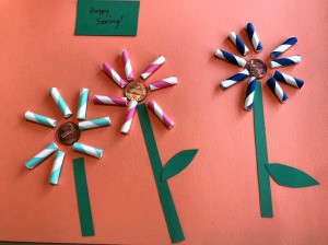 Straw Flowers on Paper - small rectangle of green paper that says Happy Spring