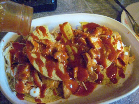 sauce added to Chicken Enchilada Casserole