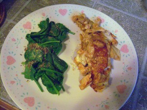 Chicken Enchilada & spinach on plate