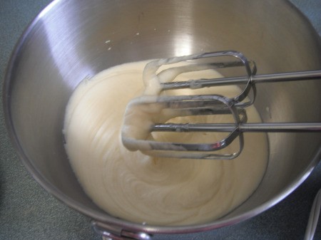 mixing butter, sugar, vanilla and egg