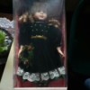 Value of a Memories Classic Collection Porcelain Doll - doll in a box