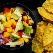 A fresh salsa made with avocados and mangoes.