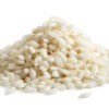 A pile of short grained arborio rice.
