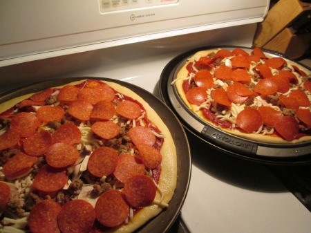 toppings added to pizza