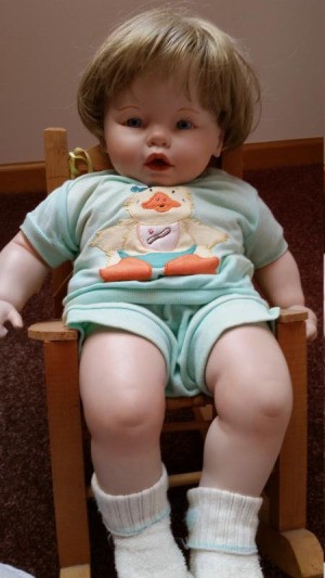 Identifying a Ceramic or Porcelain Doll - baby doll sitting on a chair
