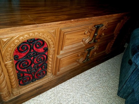 The cabinet of a vintage stereo system.