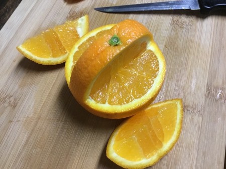 Decorative Baskets from Oranges - cut wedges out of the orange on either side of the stem to the mid point