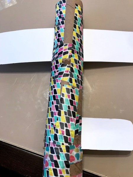 Making a Paper Towel Roll Jet Plane - add longer front wings and then the narrower rear ones