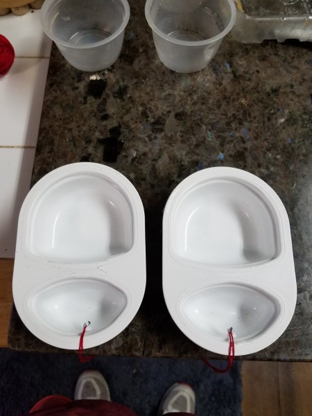 Bird Feeders Part 2 - hangers added through holes made in the containers