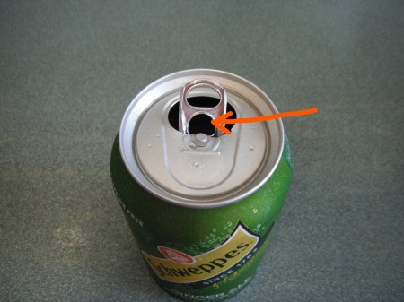 Using a Straw in a Soda Can - do not turn the tab, stick the straw through the hole made when opening the tab