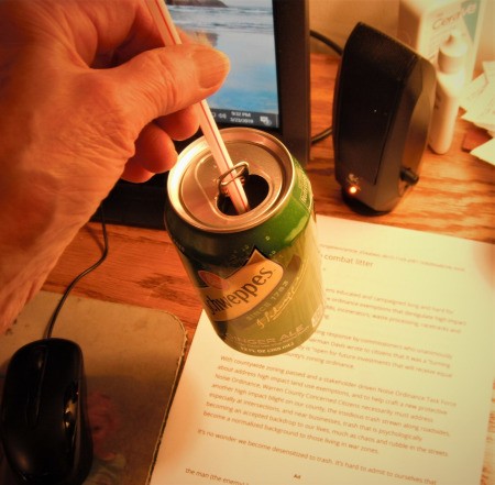 Using a Straw in a Soda Can - once empty the straw is tight enough to lift the can