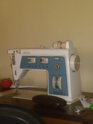 Singer Sewing Machine Not Feeding Fabric - vintage blue and white sewing machine