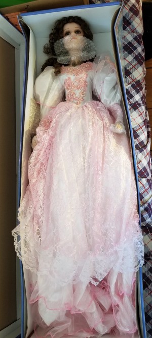 Identifying a Cathay Collection Porcelain Doll - doll wearing a long white dress with pink lace overlay