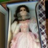 Identifying a Cathay Collection Porcelain Doll - doll wearing a long white dress with pink lace overlay