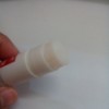 A glue stick that has been refilled with glue.