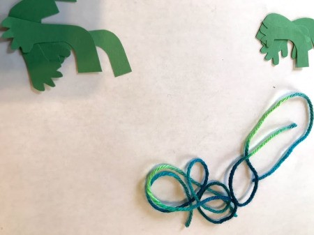 Frog and Fly Catcher Game - length of yarn