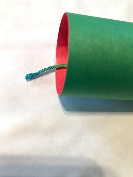 Frog and Fly Catcher Game - run yarn through the paper tube