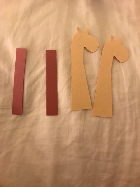 Standing Giraffe Toy - cut out two heads and two rectangles of dark brown paper