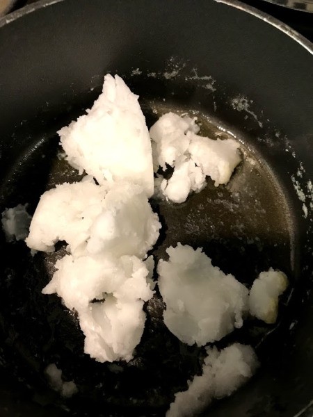 melting coconut oil on stove