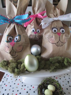 Making Bunny Bag Favors - bags clustered as a display with plastic eggs and moss