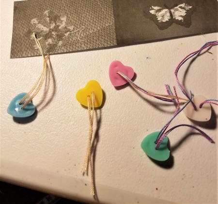 Bunny Wreath - floss run through button holes