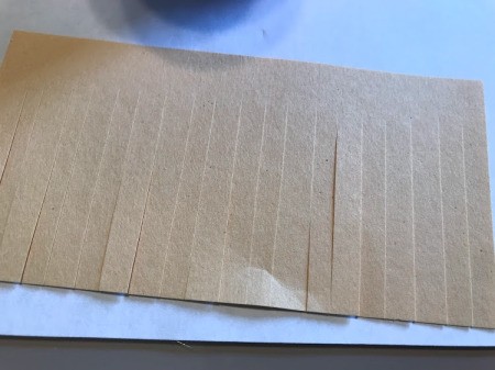 Paper Rocket Toy - cut slits leaving a 1/2 inch edge