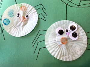 Making a Cupcake Liner Spider - finished spiders with legs and web drawn on for finishing touches