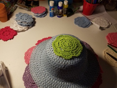 Spring Hat and Butterfly Door Hanging - green doily glued to the crown of the hat