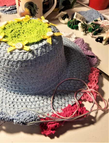 Spring Hat and Butterfly Door Hanging - draw up centers of the doilies with thread to make butterflies