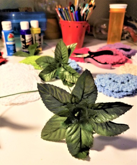 Crocheted Doily Roses - remove hard plastic center and adjust the leaves