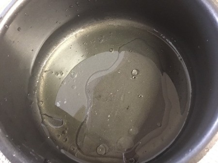 water & oil in pan