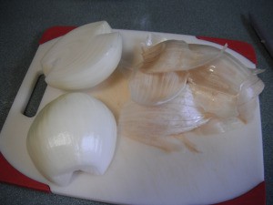 Two onion halves with the skin removed.