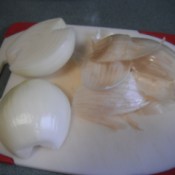 Two onion halves with the skin removed.