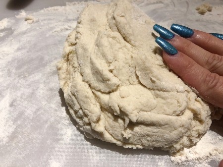 patting Cauliflower dough
