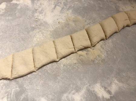 cutting gnocchi into small squares