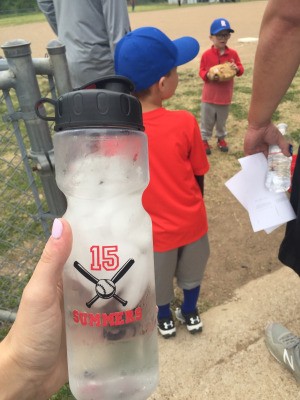 A water bottle marked with a T-Ball label.