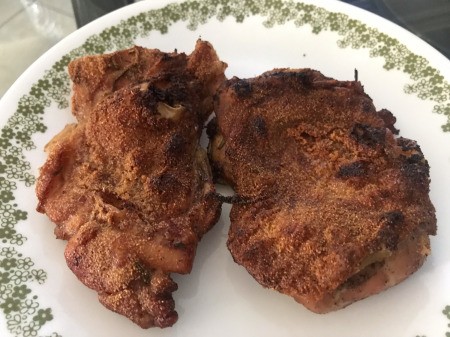 Crispy Baked Chicken Thighs on plate