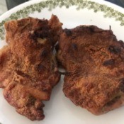 Crispy Baked Chicken Thighs on plate