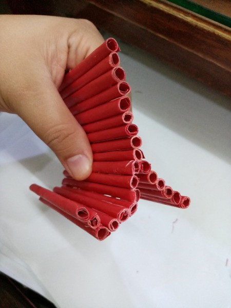 How to Make a Paper Phone Stand - glue the curved section of sticks to the flat ones like this