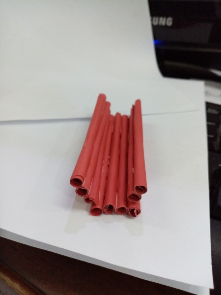 How to Make a Paper Phone Stand - roll 8 - 10 more sticks and glue together like this